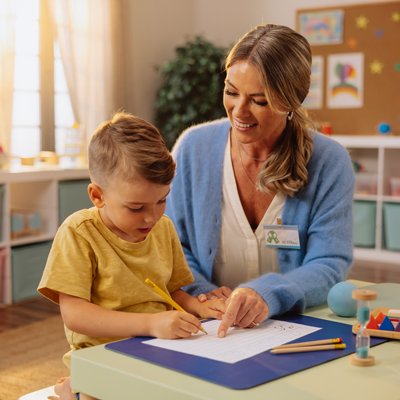 Therapist help her student form letters