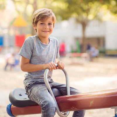 pic boy on seesaw